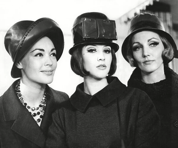 Trio of models wearing leather hats