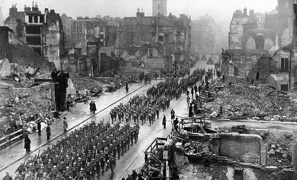 Troops march through London ruins during Remembrance service, 19