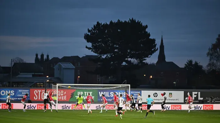 Framed Print : Welcome to Wrexham AFC-the far end of the ground where the old Kopp stand has been demolished Framed Print : Welcome to Wrexham AFC-the far end of the ground where the old Kopp stand has been demolished