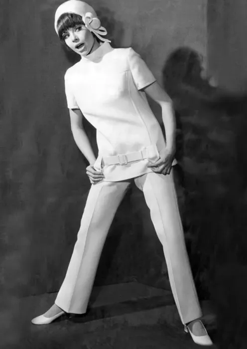 Framed Print : White trouser suit 1969 Framed Print : White trouser suit 1969