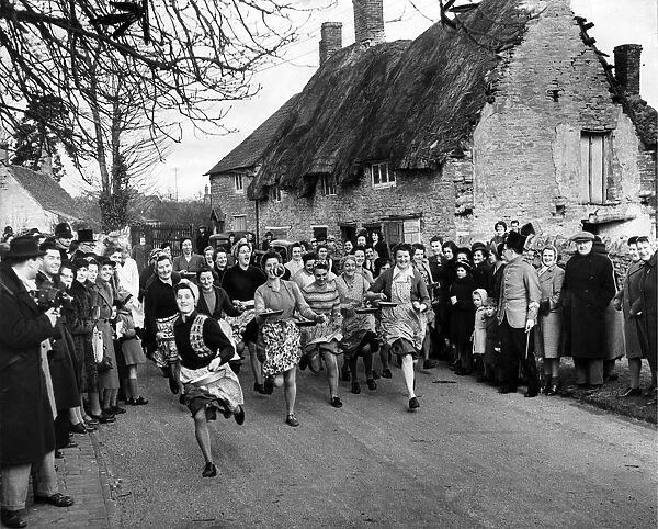 Women taking part in the annual pancake at Olney in Buckinghamshire