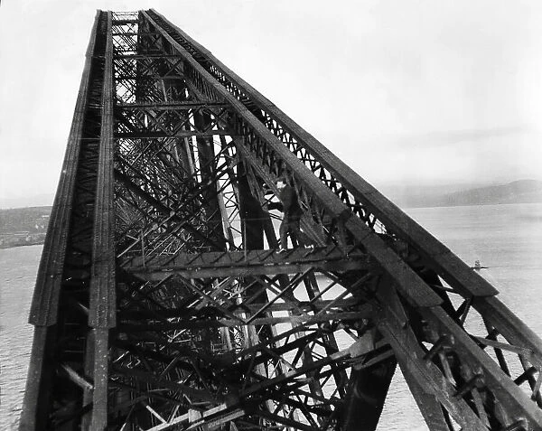 A workman on a giant girder of the Forth Bridge in Scotland. 1931