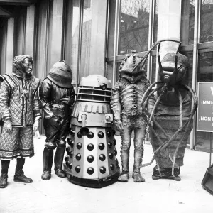 Actor Tom Baker as Dr Who, with his robot dog K-9, and assorted friends at the US Embassy 1978