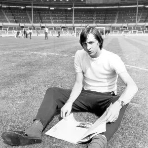 Ajax's leading goalscorer Johan Cryuff's relaxes whilst reading a magazine on the famous Wembley pitch 1971 Ajax's leading goalscorer Johan Cryuff's relaxes whilst reading a magazine on the famous Wembley pitch 1971