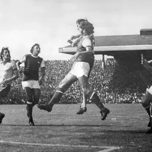 Arsenal's Alan Ball heads for a corner when put under pressure by Manchester United at Highbury Arsenal's Alan Ball heads for a corner when put under pressure by Manchester United at Highbury