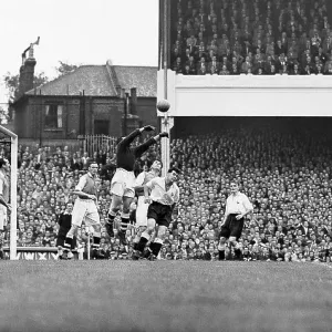 Arsenal's goalkeeper George Swindin clears a cross from the Spurs forwards during the Gunners 2-2 draw at home in 1950 Arsenal's goalkeeper George Swindin clears a cross from the Spurs forwards during the Gunners 2-2 draw at home in 1950