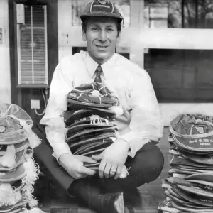 Bobby Charlton, former England and Manchester United Footballer, with his collection of England caps