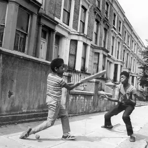 Boys playing cricket in the street 1973 Boys playing cricket in the street 1973