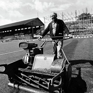 Brighton & Hove Albion groundsman Frankie Howard mows the pitch at the Goldstone Ground 1979