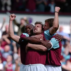 Carl Fletcher of West Ham is congratulated on his goal by team-mates Nigel Reo Coker and Teddy Sheringham Carl Fletcher of West Ham is congratulated on his goal by team-mates Nigel Reo Coker and Teddy Sheringham