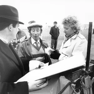 Cheltenham racecourse: Bookmaker Len da Costa from Birmingham pays out to a lucky punter Cheltenham racecourse: Bookmaker Len da Costa from Birmingham pays out to a lucky punter
