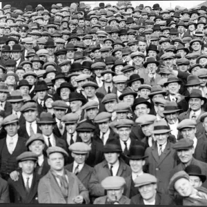 Black and white print of a crowded football stadium Black and white print of a crowded football stadium