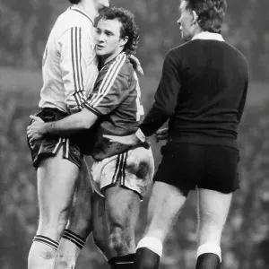David O'Leary (Arsenal) and Terry Gibson (Man. Utd) hug and make up in front of the referee after trading punches David O'Leary (Arsenal) and Terry Gibson (Man. Utd) hug and make up in front of the referee after trading punches
