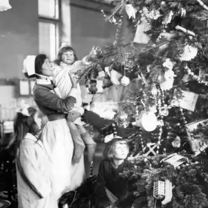 Decorating a Christmas Tree Print, 1922 Decorating a Christmas Tree Print, 1922