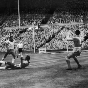 England v Brazil 1956 First goal Tommy Taylor gives goalkeeper Gilmar no chance England v Brazil 1956 First goal Tommy Taylor gives goalkeeper Gilmar no chance