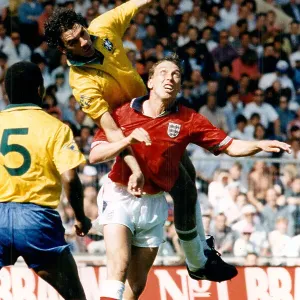England's David Platt under pressure from Brazil's Ricardo II England's David Platt under pressure from Brazil's Ricardo II