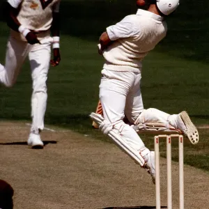 England's Hugh Morris avoids a bouncer from Curtly Ambrose Print England's Hugh Morris avoids a bouncer from Curtly Ambrose Print
