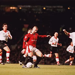 Eric Cantona in action for Manchester United in 1996