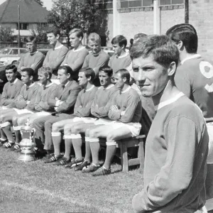 Everton F. C. New signing Alan Ball, stands to one side as last year's F. A. Cup team pose with the Cup for an official group photo shoot 1966 Everton F. C. New signing Alan Ball, stands to one side as last year's F. A. Cup team pose with the Cup for an official group photo shoot 1966
