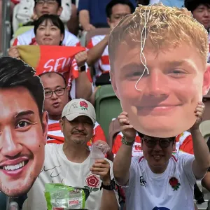 Fans with cut out masks 2024 England Rugby Summer Tour Fans with cut out masks 2024 England Rugby Summer Tour