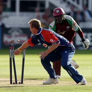 Fidel Edwards is run out by England's Paul Collingwood Fidel Edwards is run out by England's Paul Collingwood
