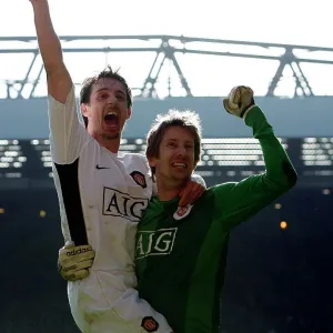 Gary Neville and Edwin Van der Sar celebrate John O'Shea's late winner print