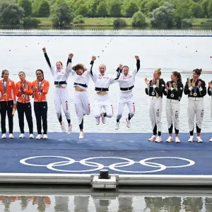 Great Britain's women's quadruple sculls celebrate on the podium as they win gold. Paris 2024 Olympics Great Britain's women's quadruple sculls celebrate on the podium as they win gold. Paris 2024 Olympics