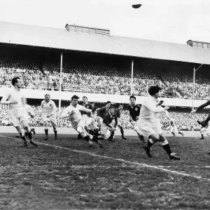 Ireland v England Rugby Jack Kyle (Ireland) kicks down field after a scrum. Ireland won 14-5 1949 Ireland v England Rugby Jack Kyle (Ireland) kicks down field after a scrum. Ireland won 14-5 1949