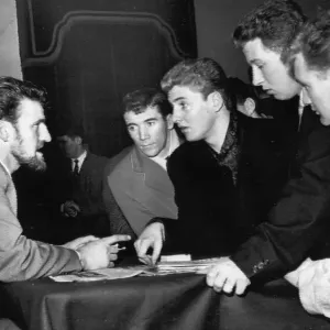 Jimmy Hill, chairman of the footballers union, the P. F. A. talking with Aston Villa players Jimmy Hill, chairman of the footballers union, the P. F. A. talking with Aston Villa players