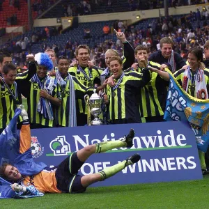 Manchester City celebrate promotion in 1999 Manchester City celebrate promotion in 1999