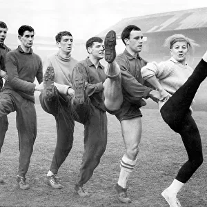 Millwall players training with a ballet dancer 1964