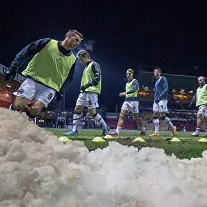 Millwall warm up in the snow 2015