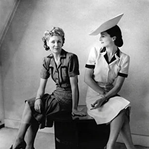 Two models wearing Utility dresses