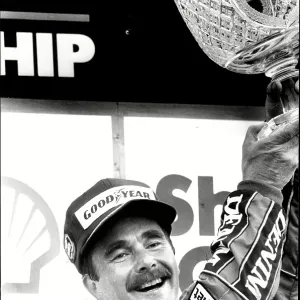 Nigel Mansell holds the trophy after winning the British Grand Prix at Silverstone Nigel Mansell holds the trophy after winning the British Grand Prix at Silverstone