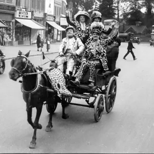 Pearly Kings and Queens in a horse and cart in Morden on way to the Epsom Derby 1935