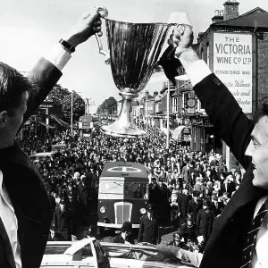 Peter Baker, left, and Jimmy Greaves with the European Cupwinners cup on their victory parade through North London 1963 Peter Baker, left, and Jimmy Greaves with the European Cupwinners cup on their victory parade through North London 1963