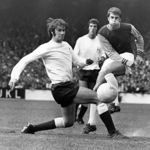 Peter Collis, Roger Morgan and Geoff Hurst in action during a Tottenham Hotspur v West Ham match 1969 Peter Collis, Roger Morgan and Geoff Hurst in action during a Tottenham Hotspur v West Ham match 1969