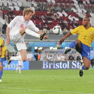 Peter Crouch and Maicon Douglas Sisenando England V Brazil in Doha Qatar