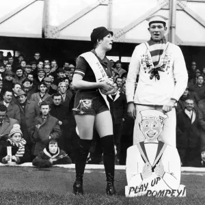 Print of Pompey club mascot and Miss Pompey at Fratton Park Print of Pompey club mascot and Miss Pompey at Fratton Park