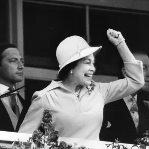 Queen Elizabeth II celebrates a win at the Derby