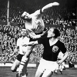 Ron Springett (England) saves from Ian St John of Scotland in 1961 Ron Springett (England) saves from Ian St John of Scotland in 1961