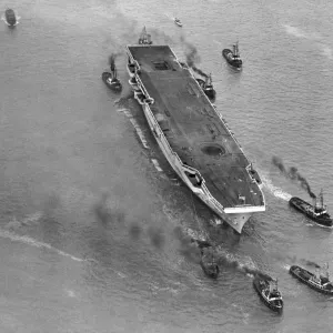 Print of HMS Ark Royal being towed to Gladstone Docks Print of HMS Ark Royal being towed to Gladstone Docks