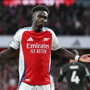 Saka celebrates his goal