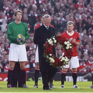 Sir Alex Ferguson holding a wreath to commemorate 50 years since the Munich Air disaster Sir Alex Ferguson holding a wreath to commemorate 50 years since the Munich Air disaster