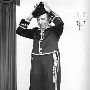 Sir Matt Busby, in ceremonial dress as Knight Commander of St Gregory, 1972