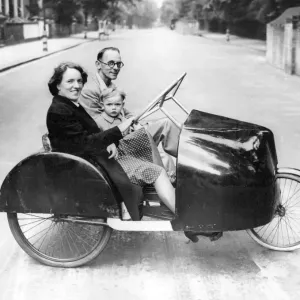 Full Size Pedal Car Print of Mr and Mrs Bottani on Kilburn High Road Full Size Pedal Car Print of Mr and Mrs Bottani on Kilburn High Road