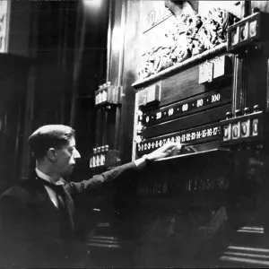 Snooker referee Charlie Chambers, resident at Thurston's for twenty five years, marks the scoreboard