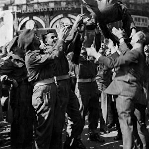 Soldiers celebrate VJ Day