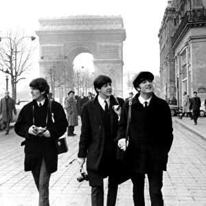 TheBeatles in Paris in front of the Arc de Triomphe