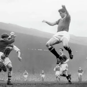 Tommy Taylor ( in mid-air) scoring the fifth goal for Manchester United 1957 Tommy Taylor ( in mid-air) scoring the fifth goal for Manchester United 1957
